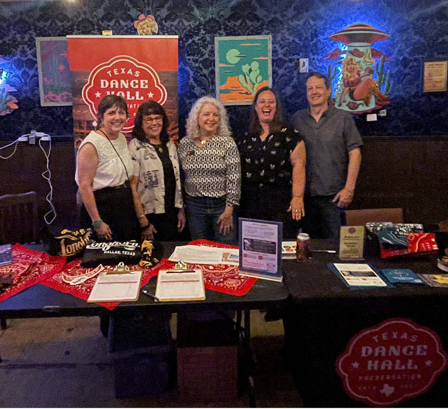 TDHP Board Members from june 2026 - standing behind a table full of swag